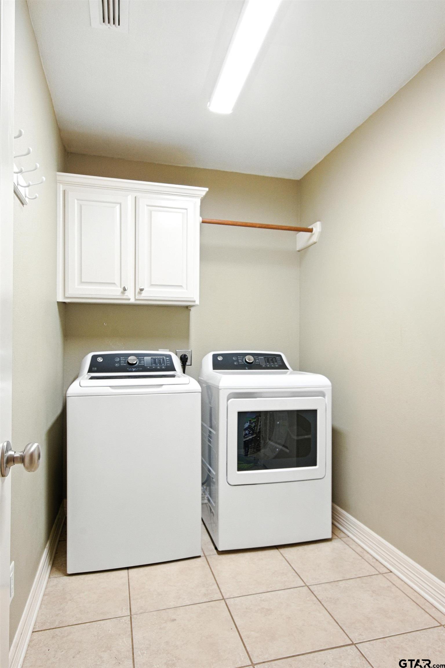 704 Windover Lane Bullard, TX 75757 - Photo 11 of 23 a utility room with dryer and washer