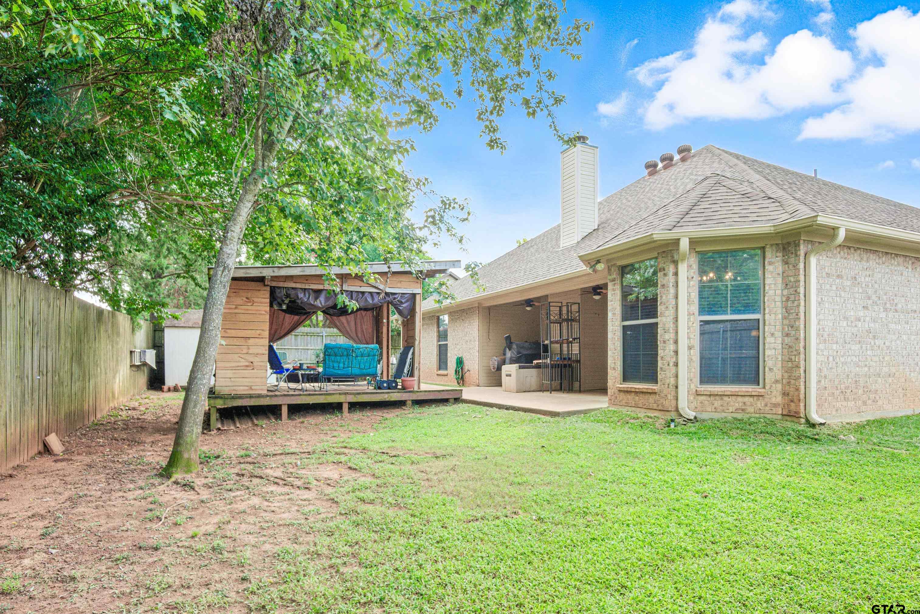 704 Windover Lane Bullard, TX 75757 - Photo 19 of 23 a front view of a house with a garden and porch