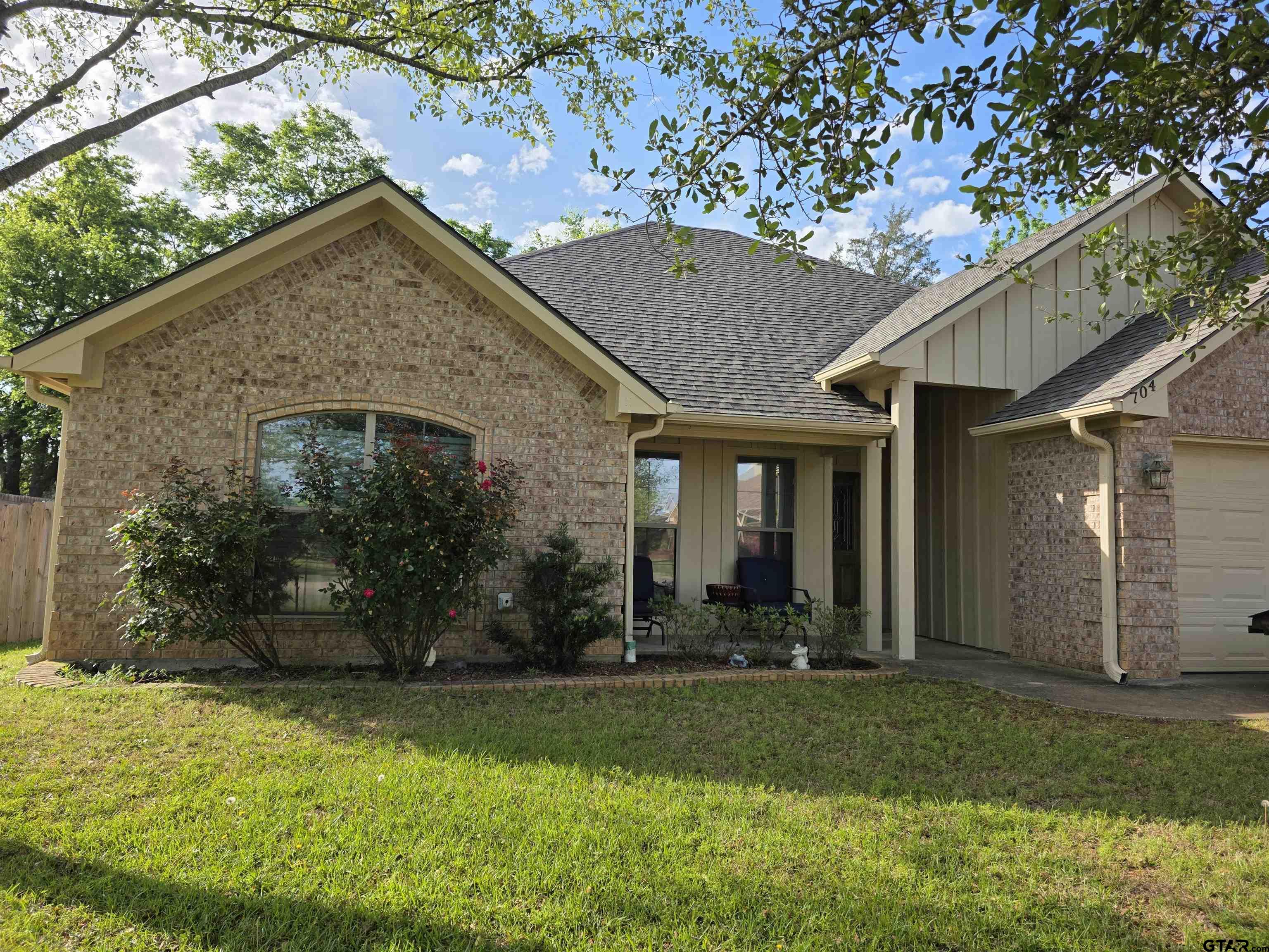 704 Windover Lane Bullard, TX 75757 - Photo 2 of 23 a front view of a house with a yard