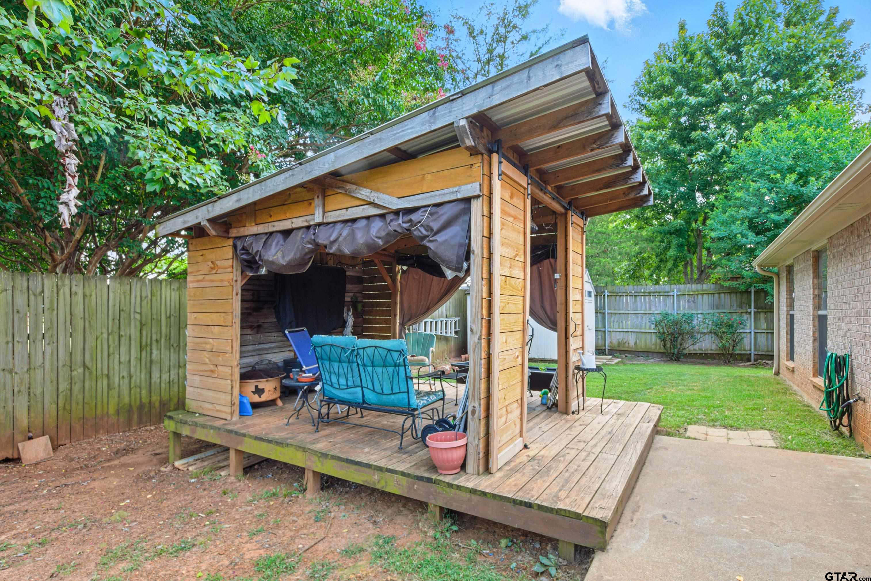 704 Windover Lane Bullard, TX 75757 - Photo 21 of 23 a backyard of a house with seating space