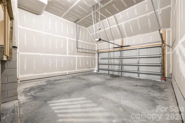 a view of a garage with racks on the wall