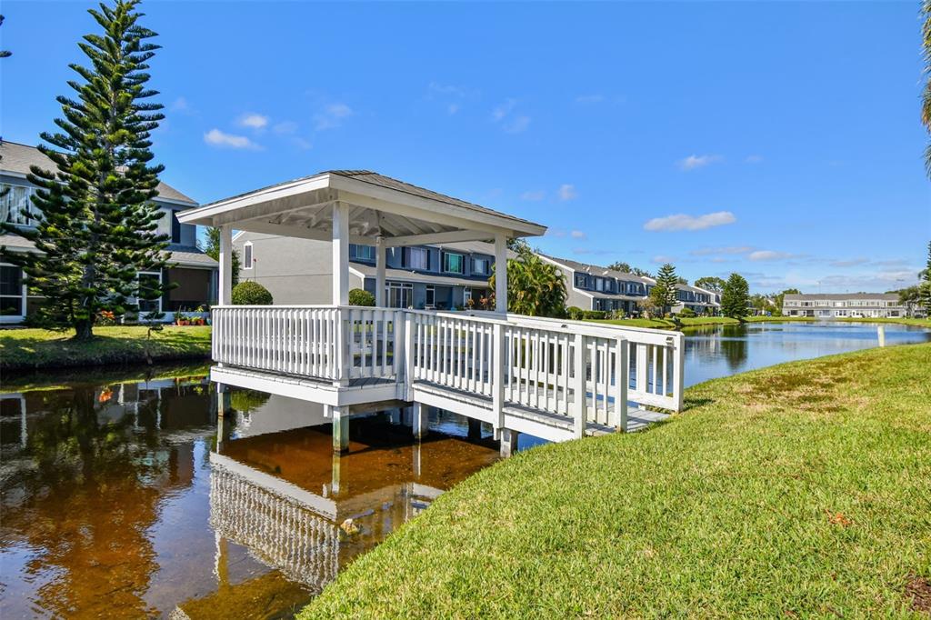 382 Countryside Key Boulevard Oldsmar, FL 34677 - Photo 55 of 58 a view of a house with swimming pool and sitting area