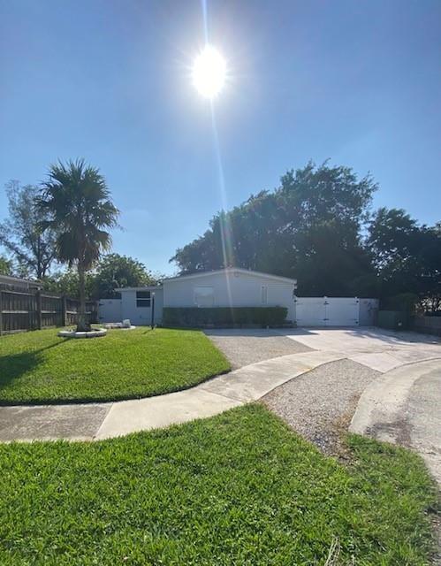 10666 South 228th Lane Boca Raton, FL 33428 - Photo 1 of 12 a view of backyard with green space