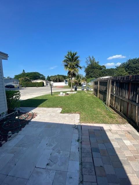 10666 South 228th Lane Boca Raton, FL 33428 - Photo 12 of 12 a view of swimming pool with a yard