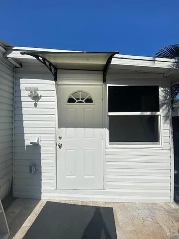 a front view of a house with a garage
