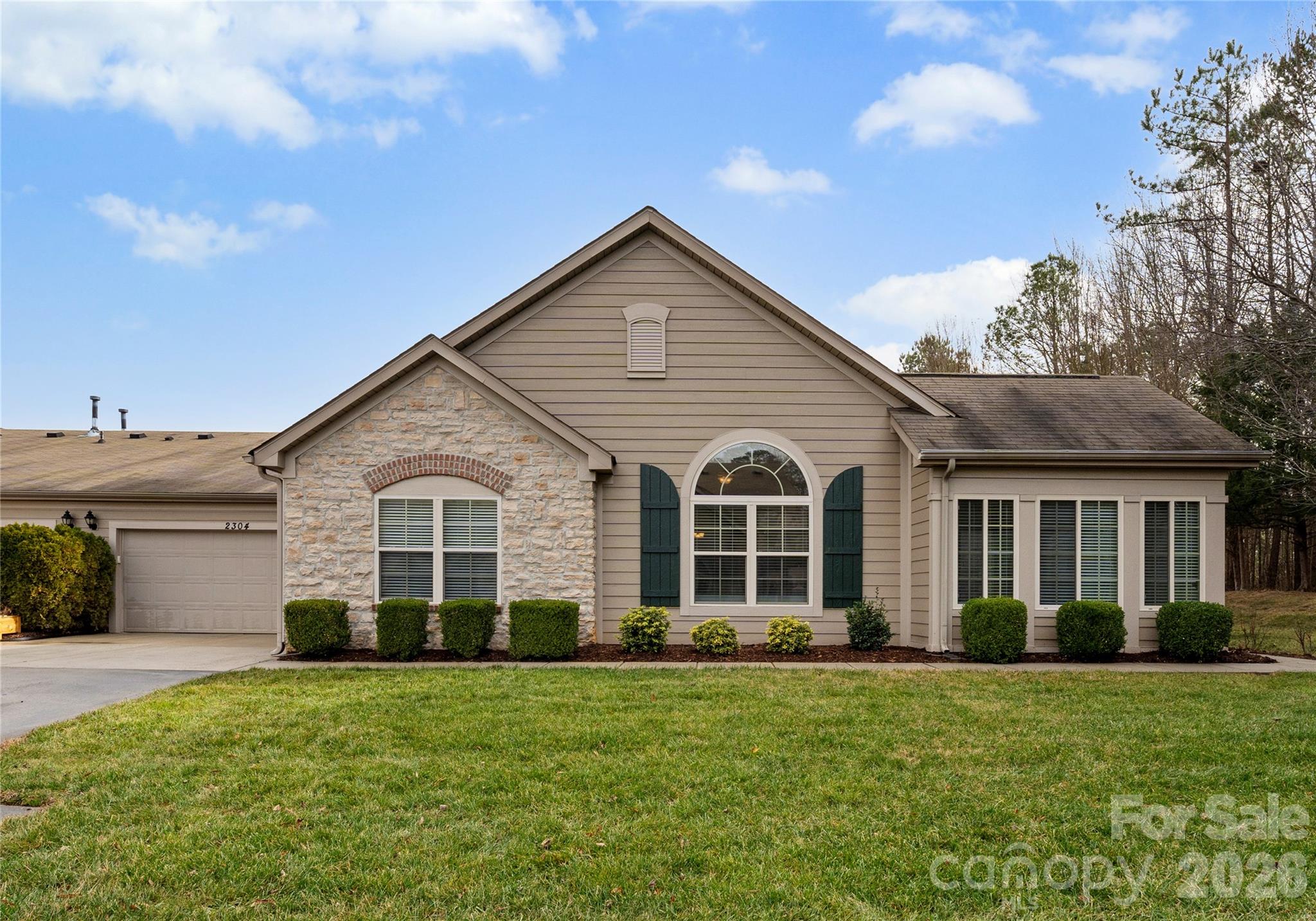 2304 Coltsview Lane Matthews, NC 28105 - Photo 22 of 36 a view of a house with backyard and garden
