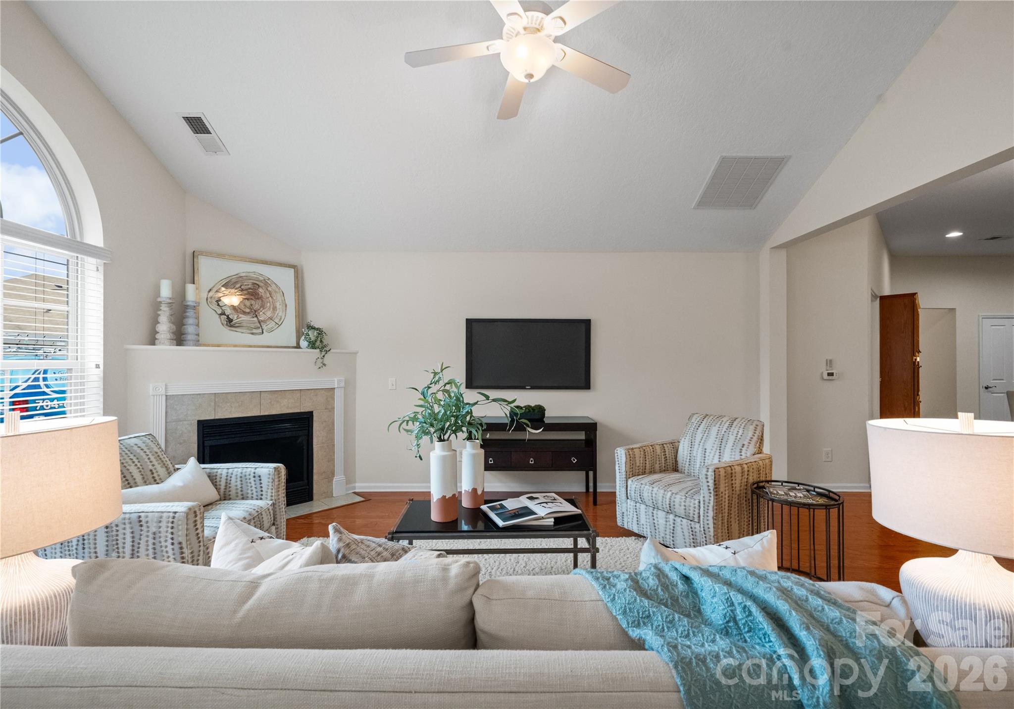 2304 Coltsview Lane Matthews, NC 28105 - Photo 5 of 36 a living room with furniture fireplace and window