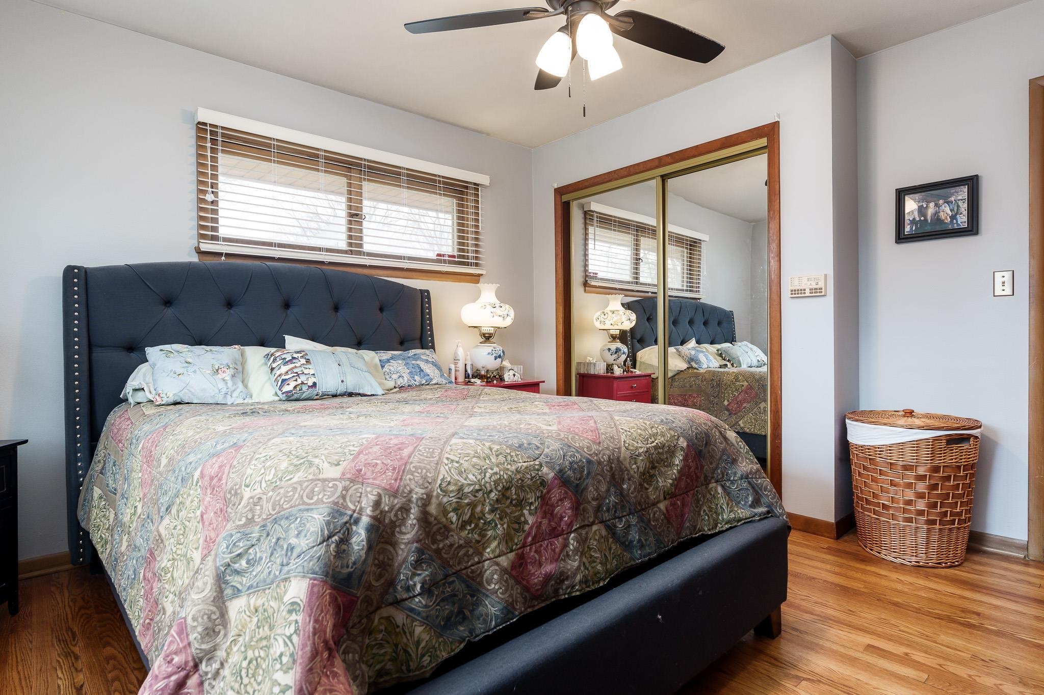 3704 Highcrest Road Rockford, IL 61107 - Photo 21 of 33 a bed sitting in a bedroom next to a window