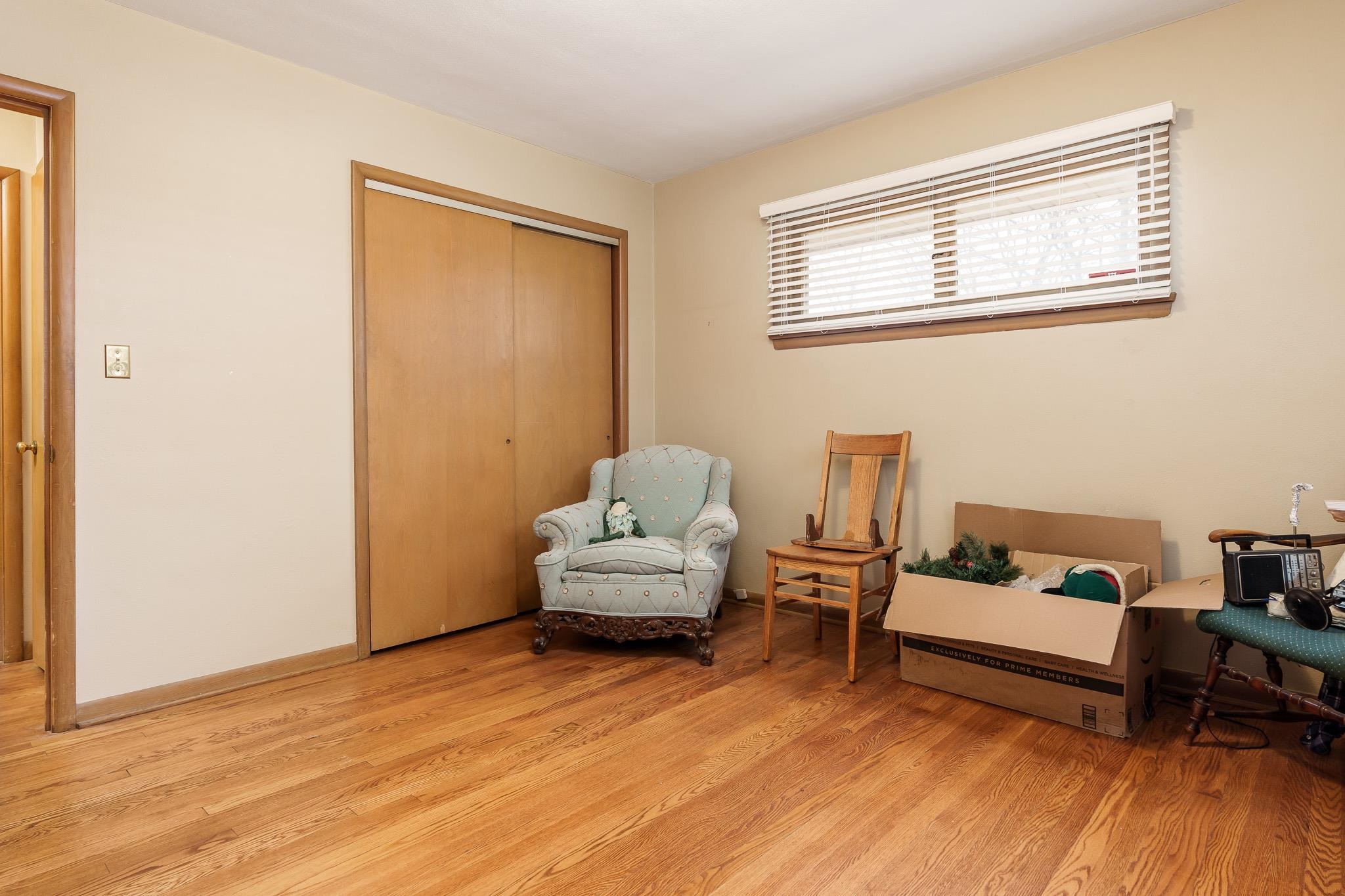 3704 Highcrest Road Rockford, IL 61107 - Photo 23 of 33 a living room with furniture and a window