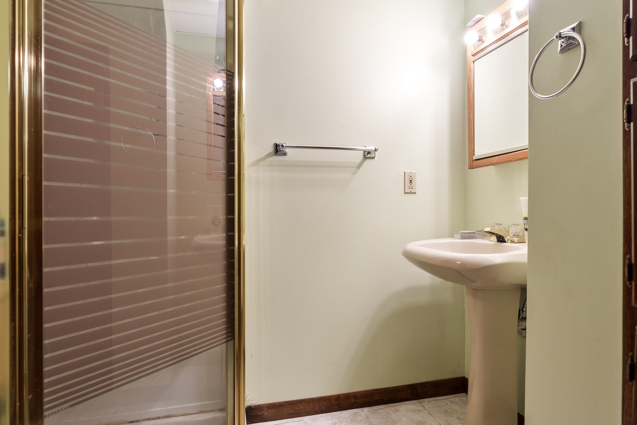 3704 Highcrest Road Rockford, IL 61107 - Photo 28 of 33 a bathroom with a sink