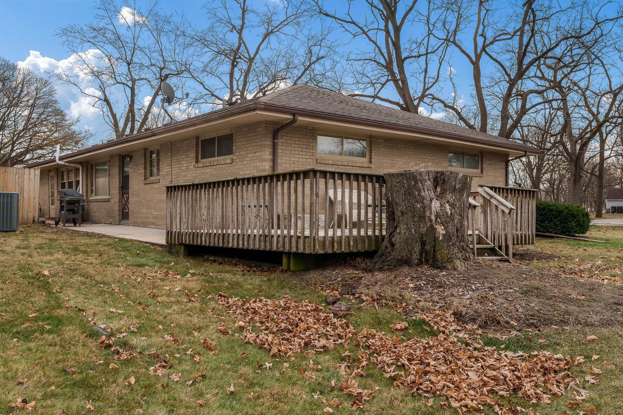 3704 Highcrest Road Rockford, IL 61107 - Photo 31 of 33 a view of a house with a yard