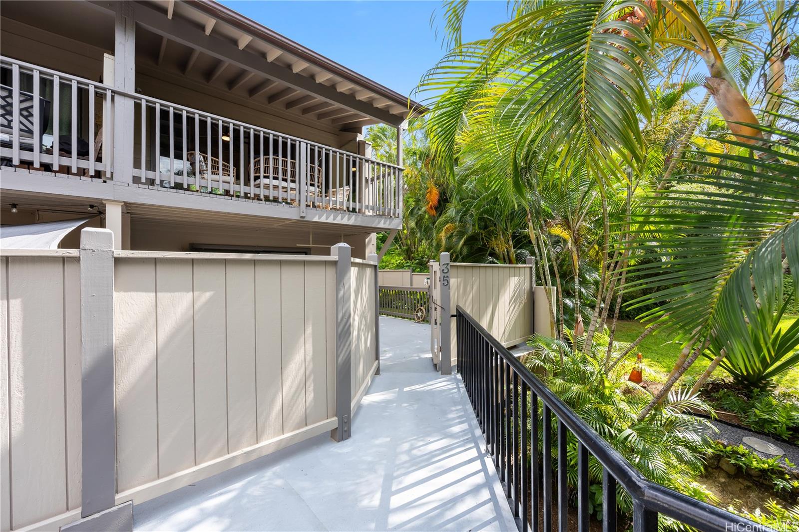 45-995 Wailele Road, Unit 35 Kaneohe, HI 96744 - Photo 12 of 25 #35 is a corner end unit providing privacy amongst lush landscaping