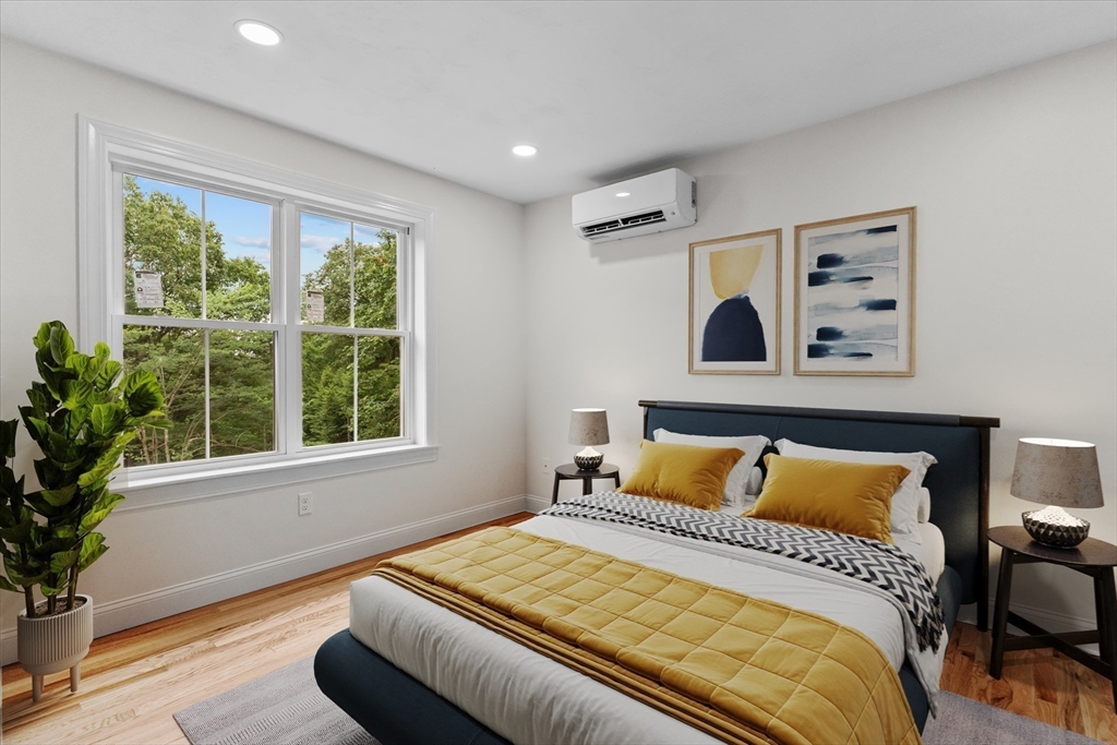 508 Pine Street Leicester, MA 01524 - Photo 17 of 34 a bedroom with a bed and wooden floor