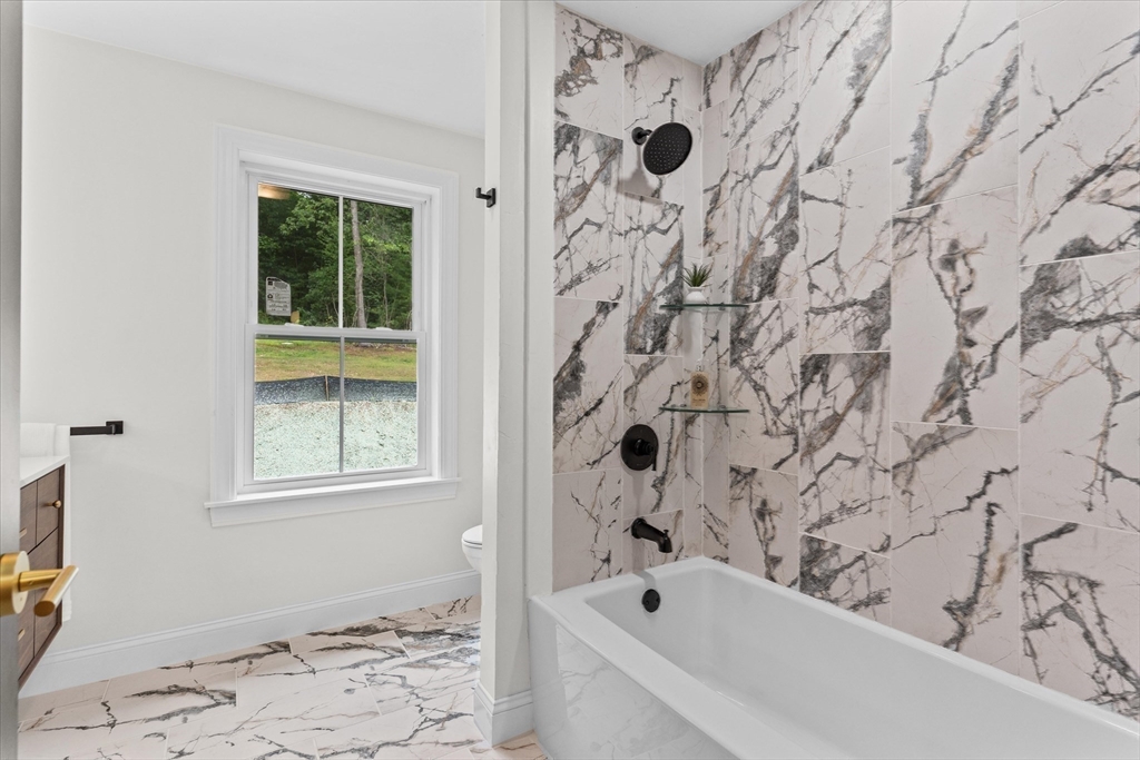 508 Pine Street Leicester, MA 01524 - Photo 22 of 34 a bathroom with a bathtub and shower