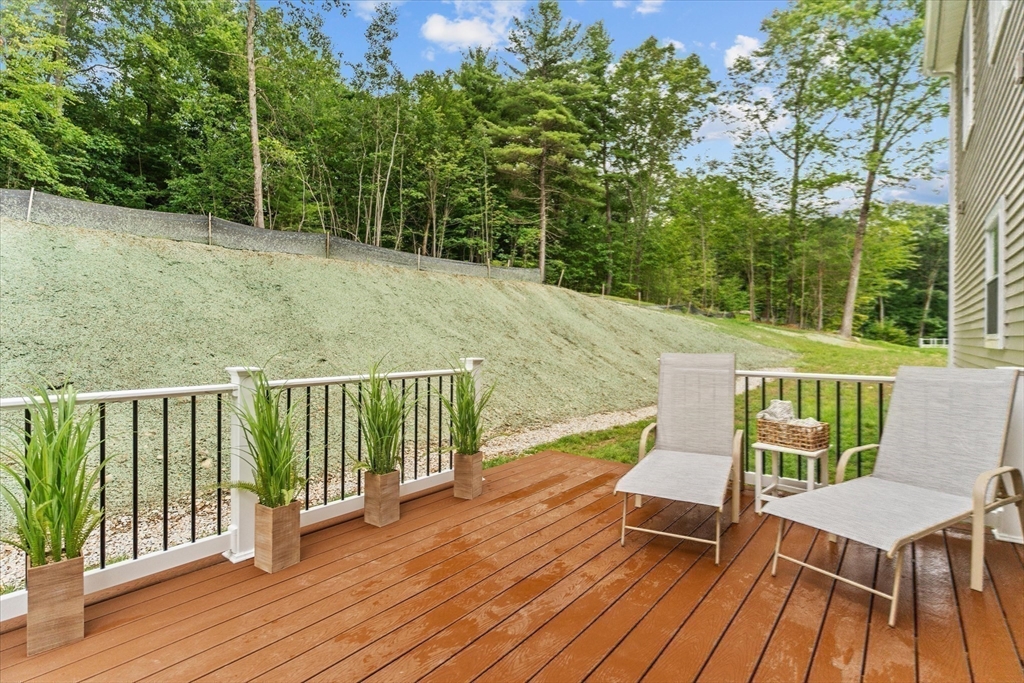 508 Pine Street Leicester, MA 01524 - Photo 29 of 34 a view of a deck with furniture and wooden deck