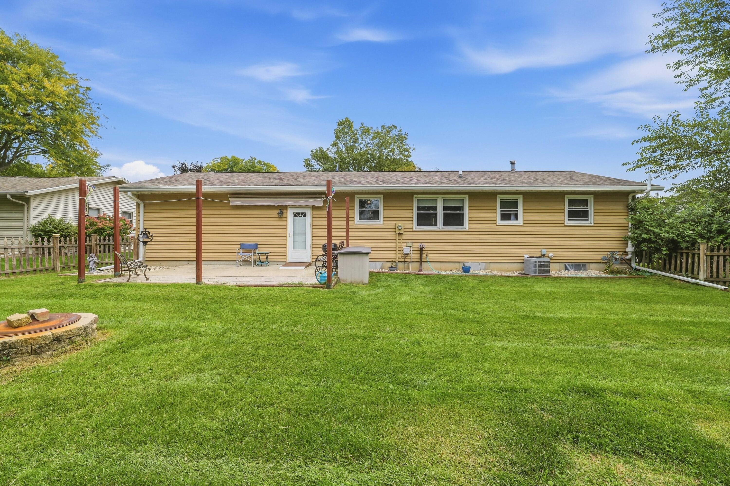 1108 Homestead Road Beaver Dam, WI 53916 - Photo 33 of 42 Backyard with Patio