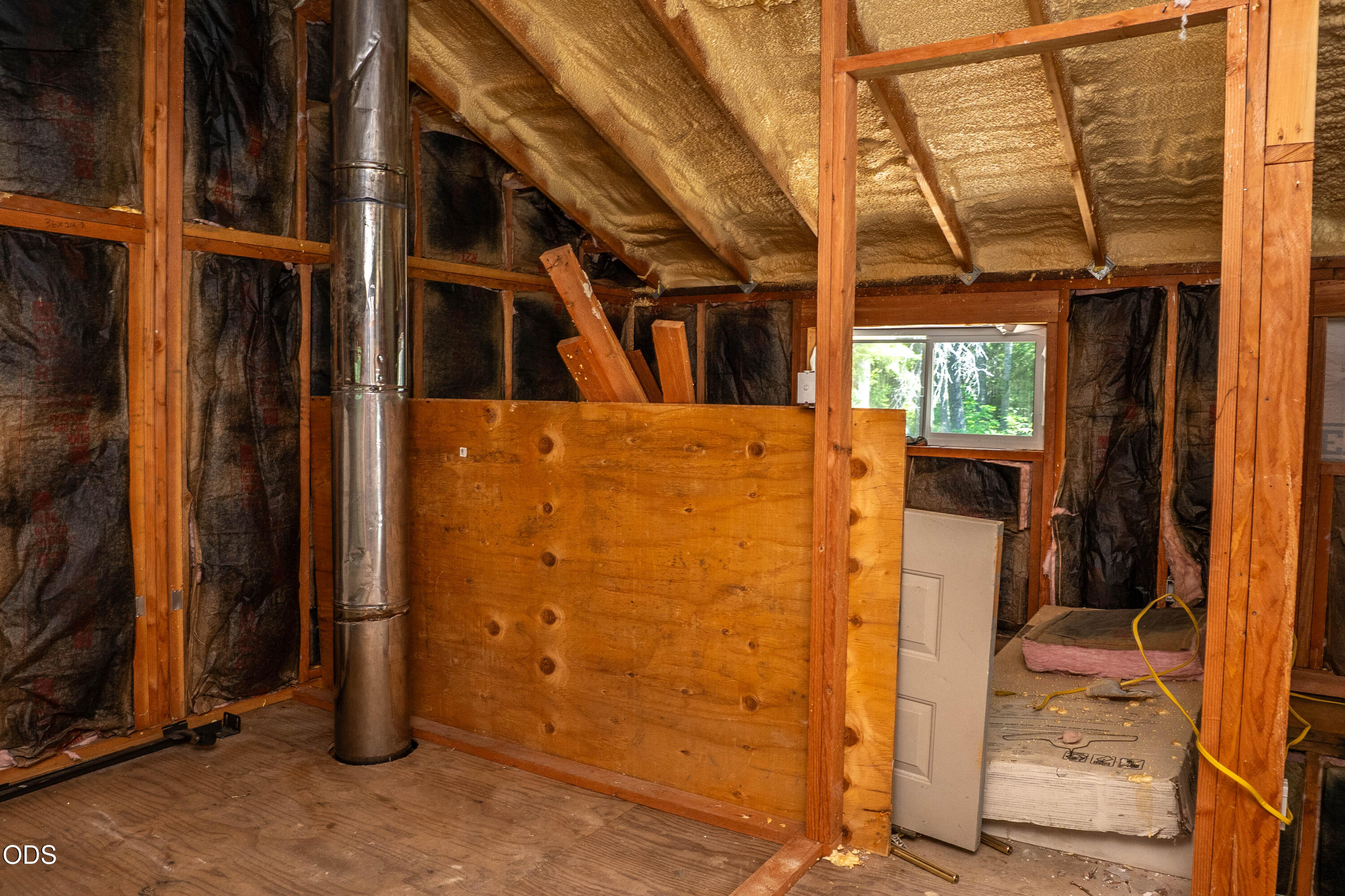 8245 Jumpoff Joe Creek Road Grants Pass, OR 97526 - Photo 24 of 43 a view of a door with wooden walls