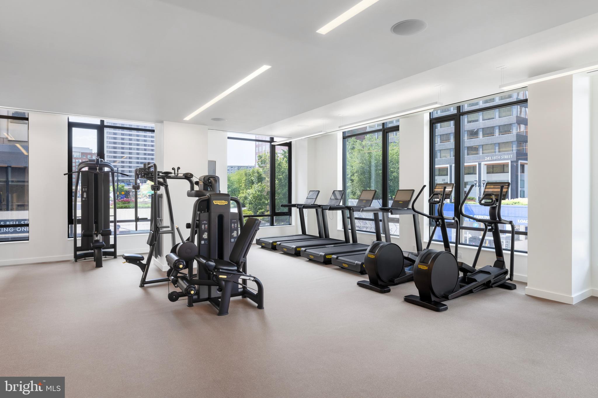 269 19th Court South, Unit PH2302 Arlington, VA 22202 - Photo 13 of 28 a view of a room with gym equipment