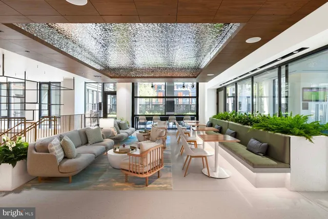 a outdoor space with patio the couches and a potted plant