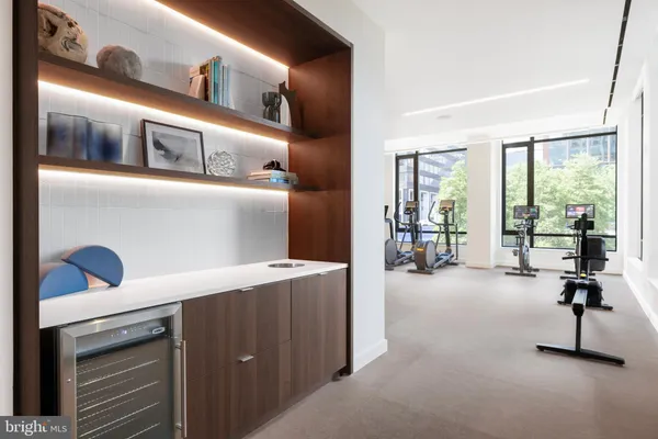 a swimming pool with outdoor seating and yard