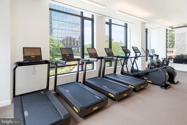 a view of swimming pool with outdoor seating