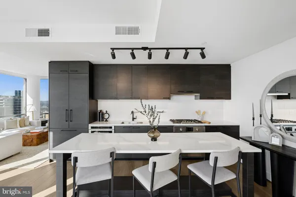 a lobby with furniture and floor to ceiling window