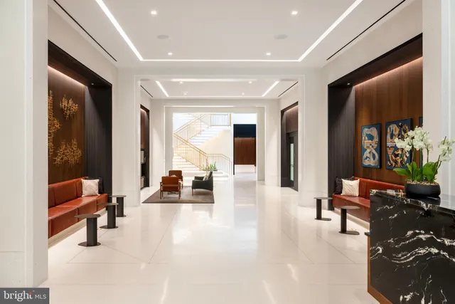 a room with a table and chairs