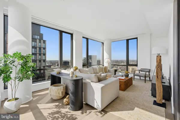 a room with gym equipment and a large window