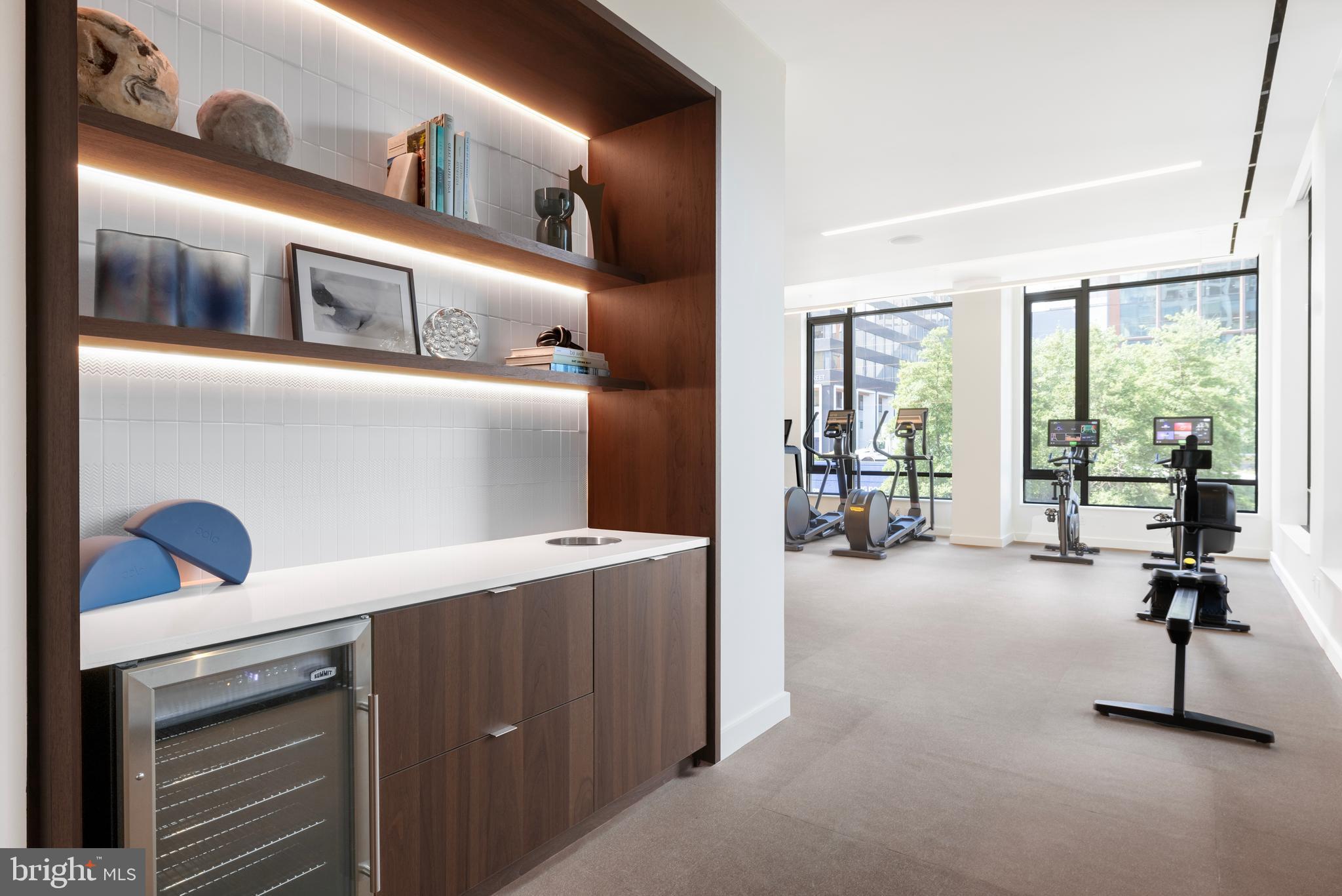 269 19th Court South, Unit PH2302 Arlington, VA 22202 - Photo 10 of 28 a view of a livingroom with furniture and floor to ceiling window
