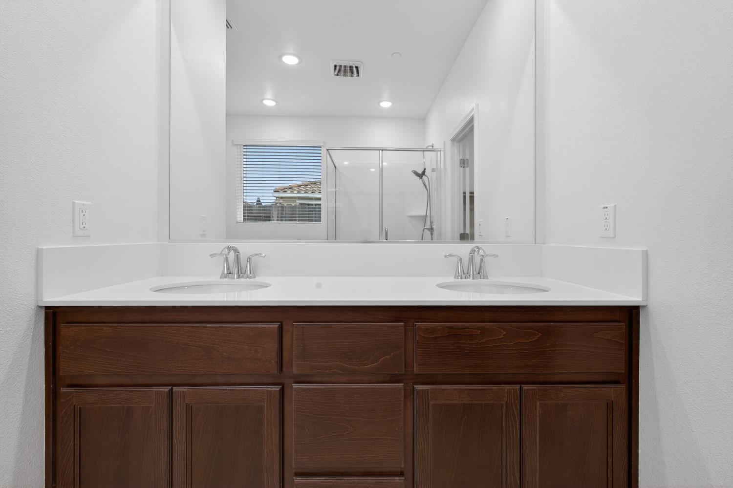 2340 Bellows Way Lodi, CA 95242 - Photo 32 of 42 a bathroom with a sink and a mirror