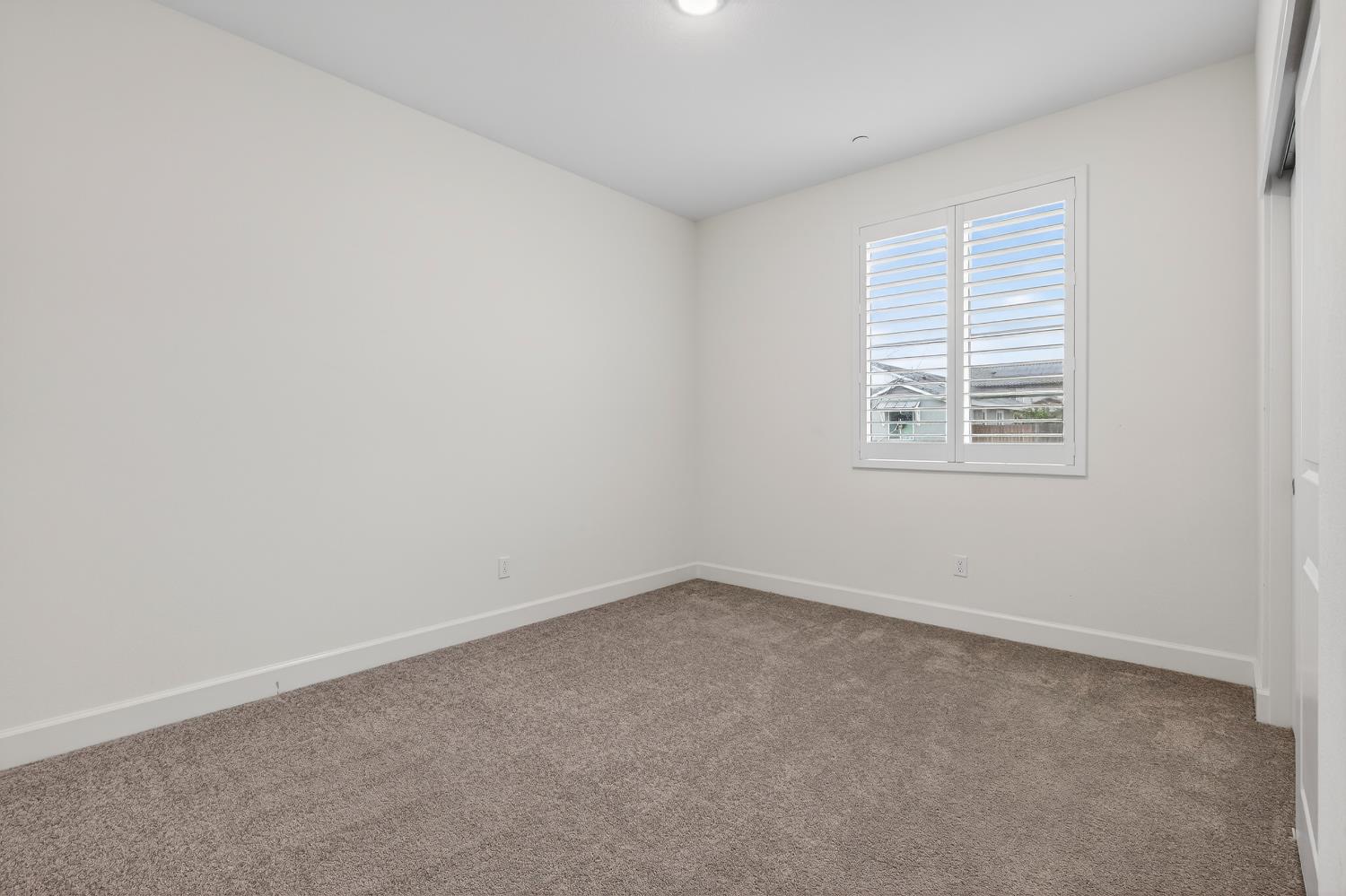 2340 Bellows Way Lodi, CA 95242 - Photo 5 of 42 an empty room with a window
