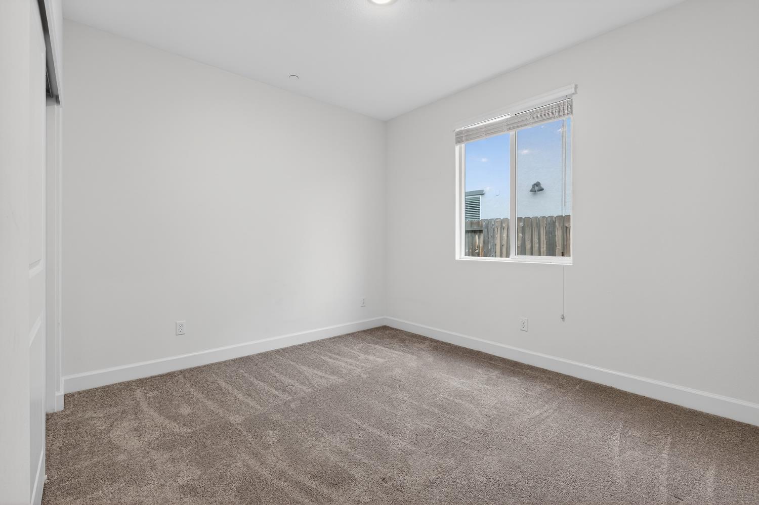 2340 Bellows Way Lodi, CA 95242 - Photo 9 of 42 an empty room with a window