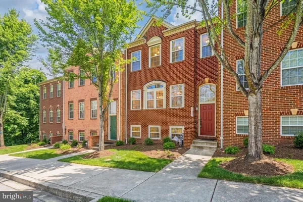 a front view of a multi story residential apartment buildings