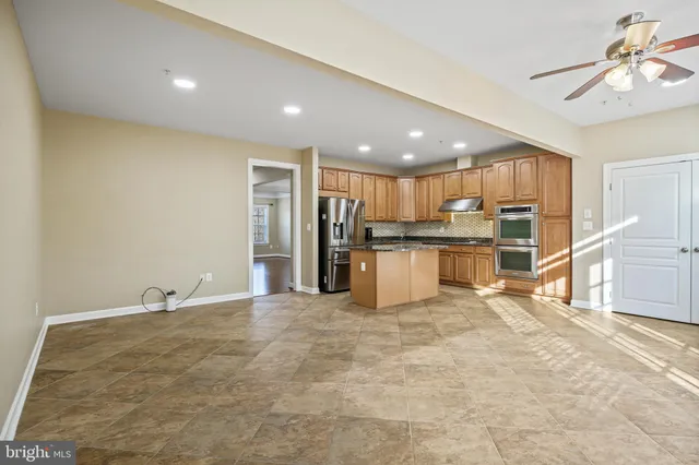 a view of kitchen with wooden floor
