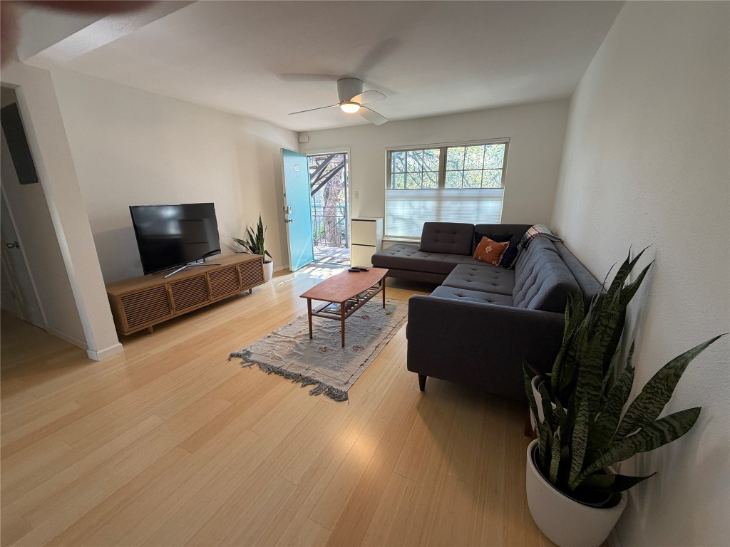300 Crockett Street, Unit 201 Austin, TX 78704 - Photo 22 of 32 a living room with furniture and a flat screen tv