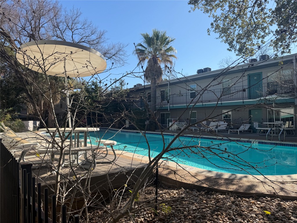 300 Crockett Street, Unit 201 Austin, TX 78704 - Photo 24 of 32 a view of backyard with swimming pool and patio