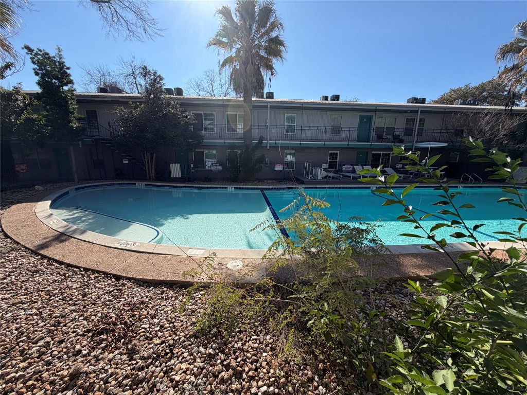 300 Crockett Street, Unit 201 Austin, TX 78704 - Photo 25 of 32 a view of a swimming pool with a yard