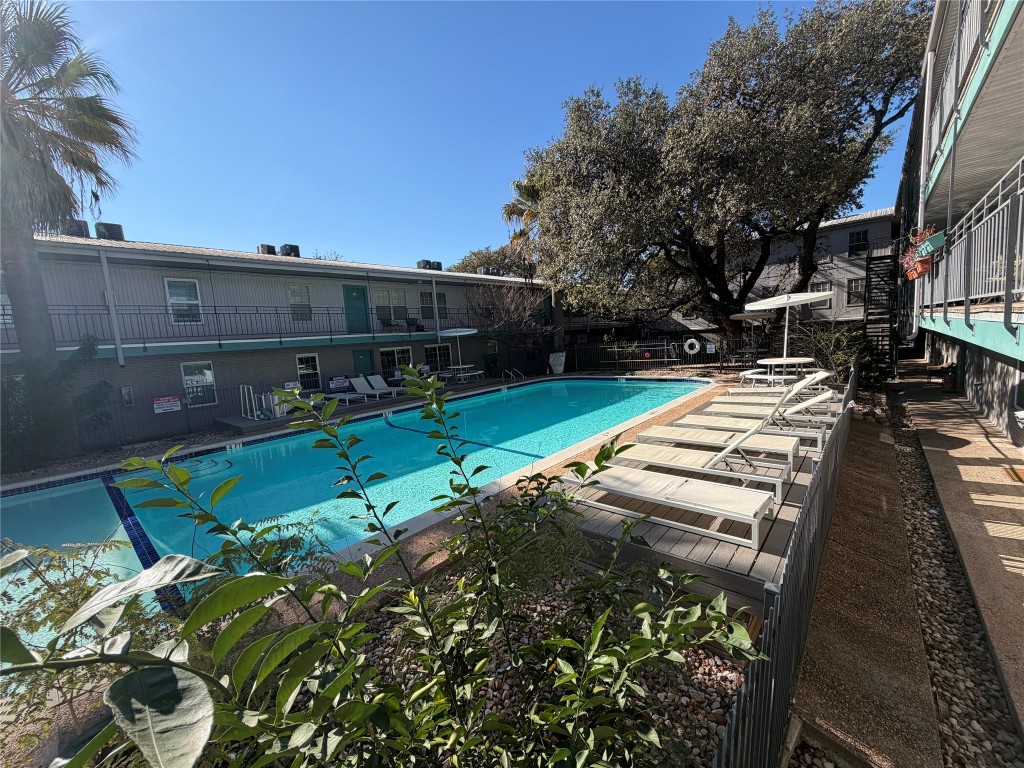 300 Crockett Street, Unit 201 Austin, TX 78704 - Photo 26 of 32 a view of a backyard with sitting area