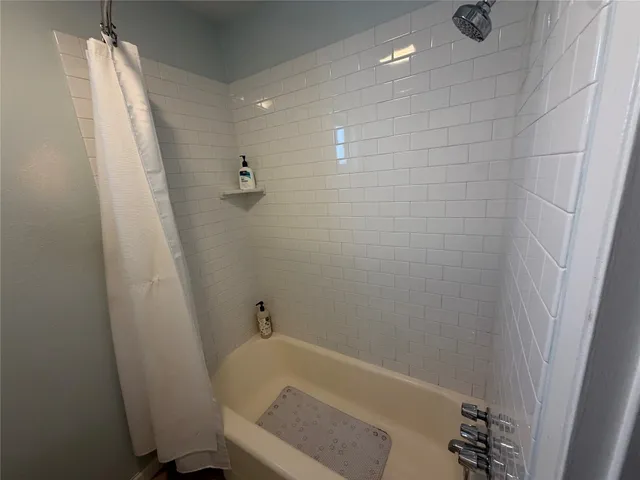 a bathroom with a bathtub
