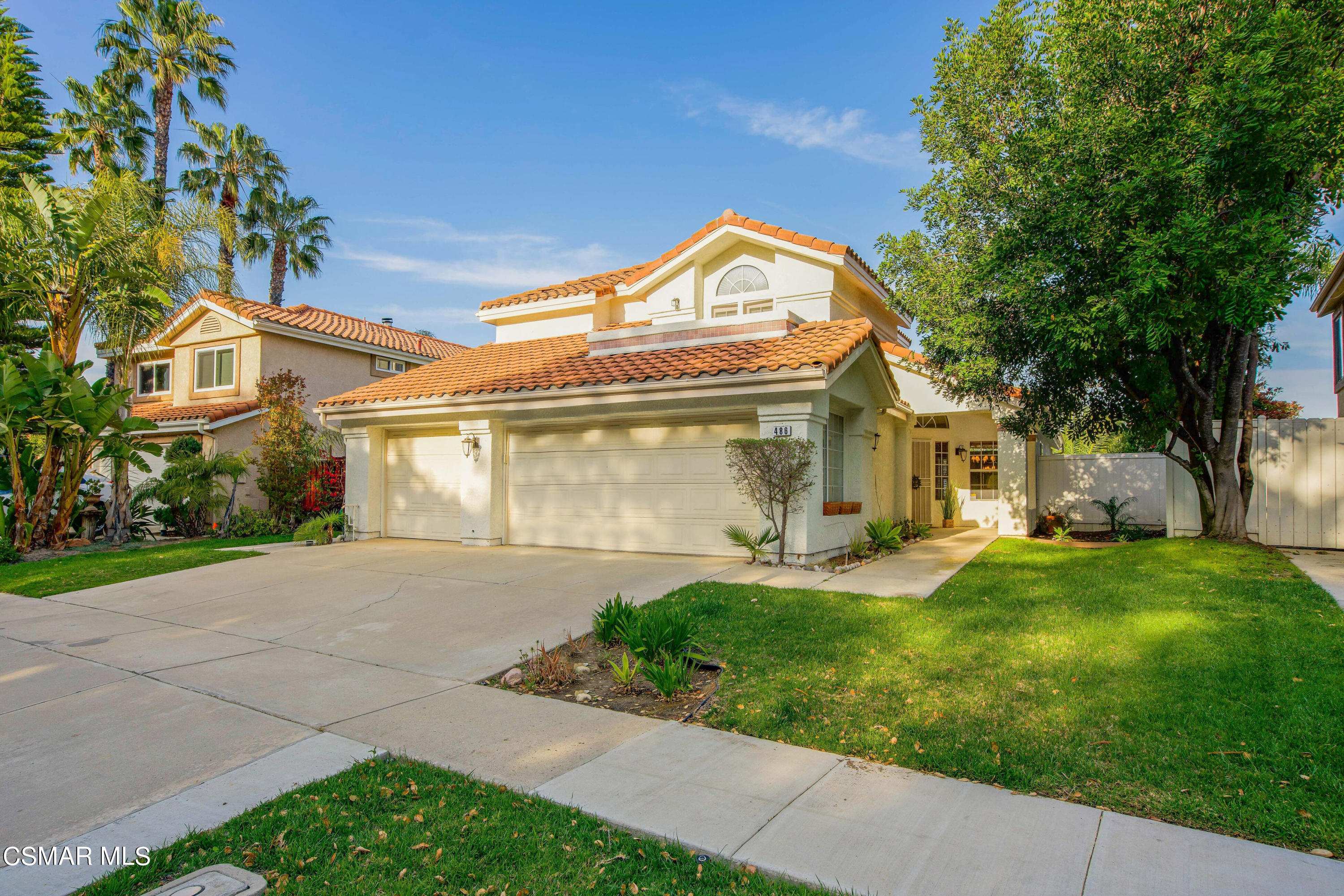 486 Fresh Meadows Road Simi Valley, CA 93065 - Photo 1 of 30 a front view of a house with garden