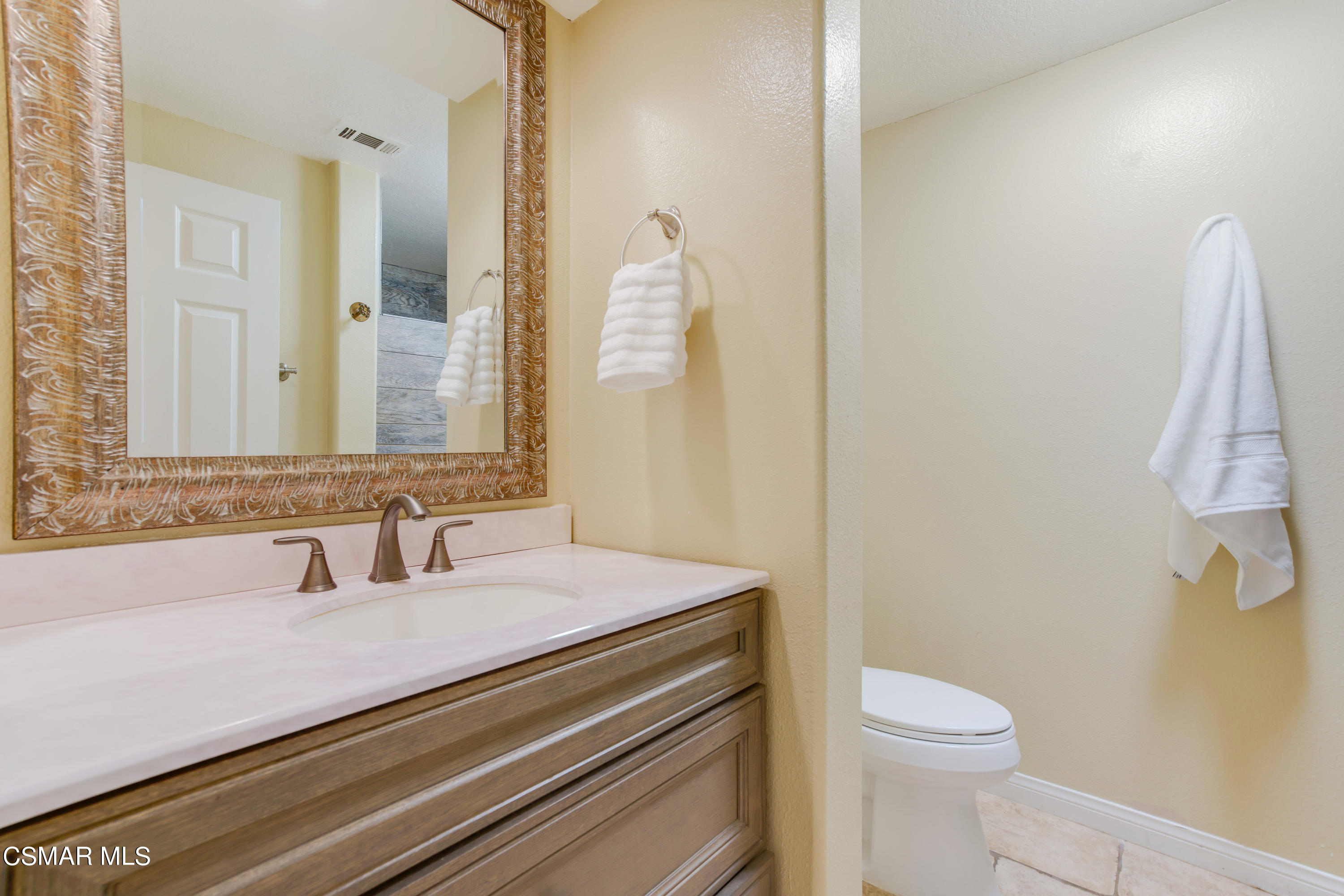 486 Fresh Meadows Road Simi Valley, CA 93065 - Photo 15 of 30 a bathroom with a sink a toilet and shower