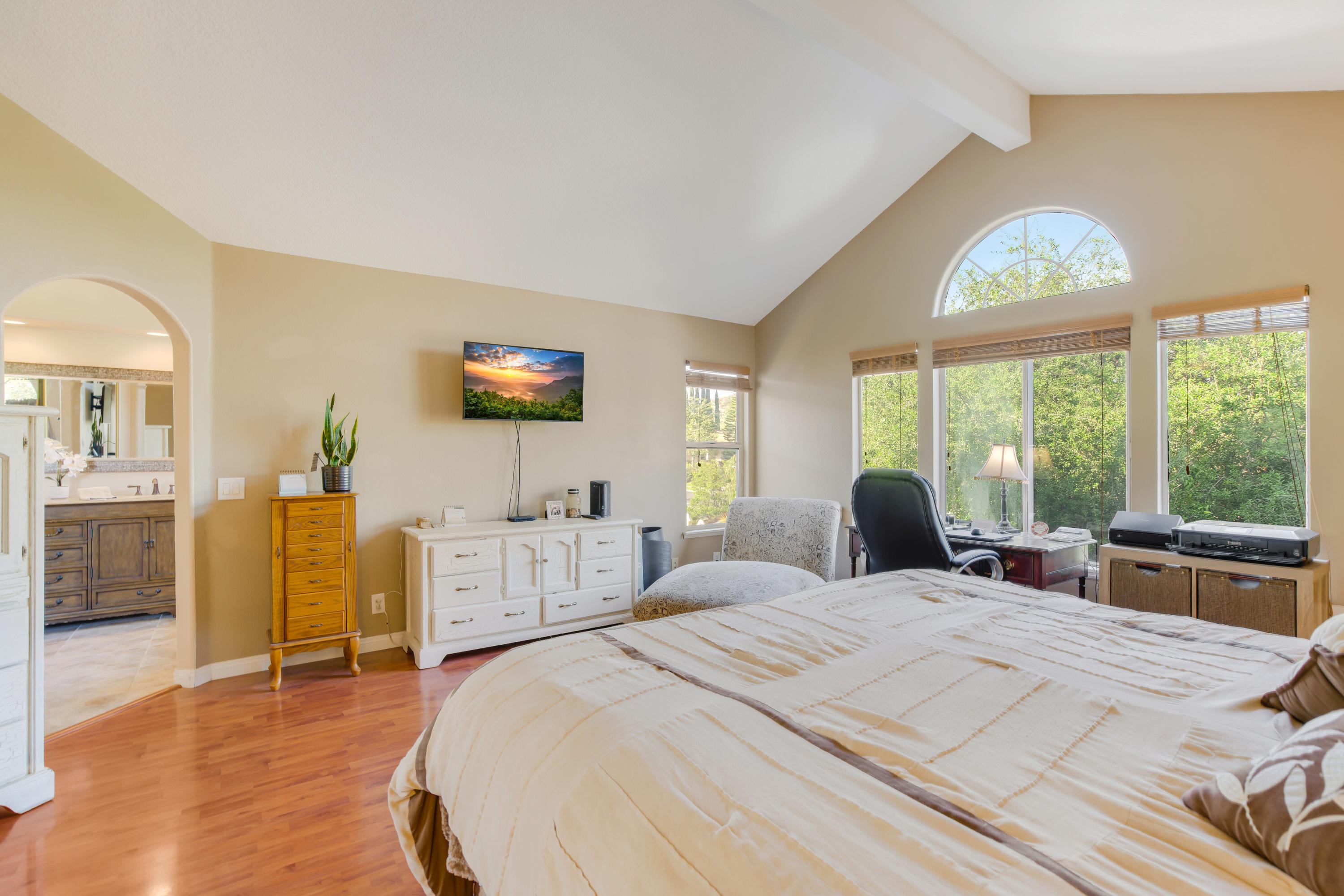 486 Fresh Meadows Road Simi Valley, CA 93065 - Photo 16 of 30 a bedroom with a large bed and a large window
