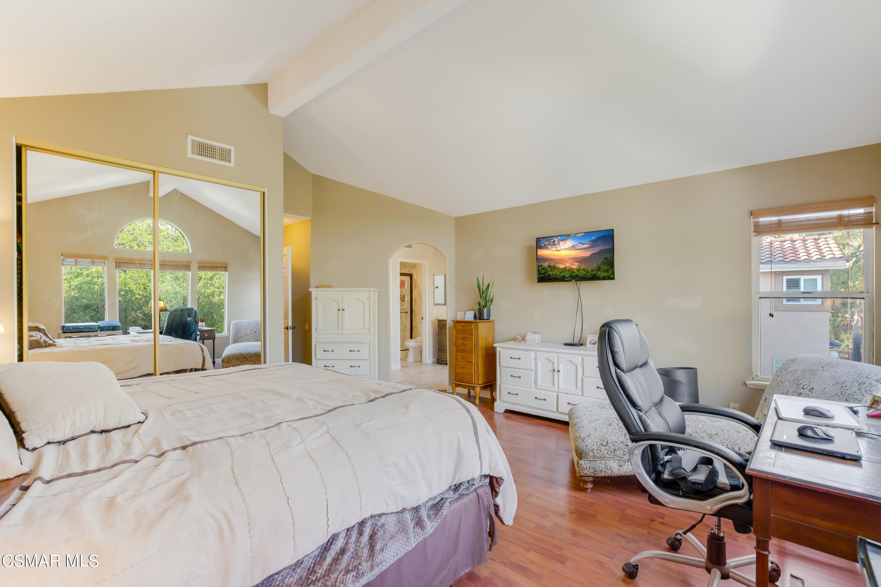 486 Fresh Meadows Road Simi Valley, CA 93065 - Photo 17 of 30 a bedroom with a bed and wooden floor