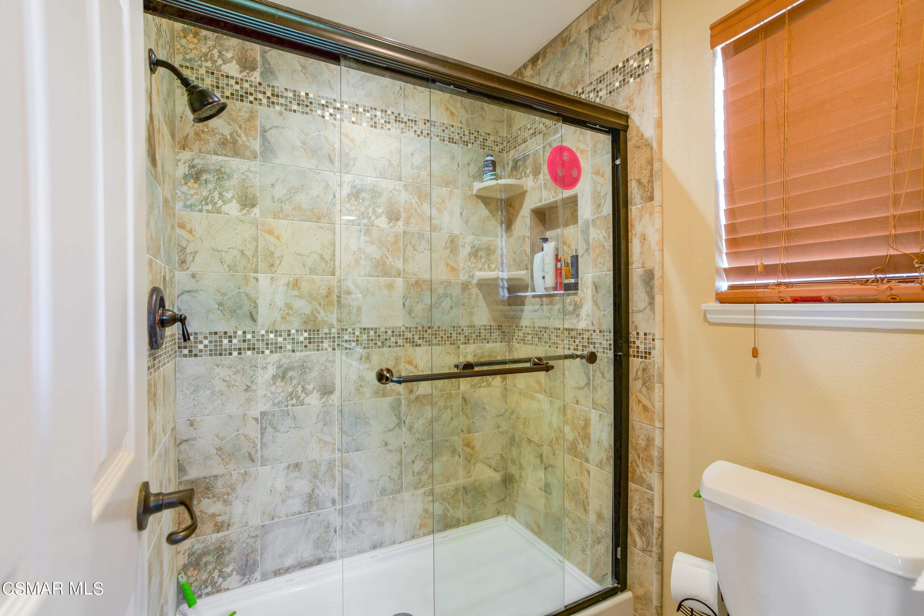 486 Fresh Meadows Road Simi Valley, CA 93065 - Photo 19 of 30 a bathroom with a shower and a toilet