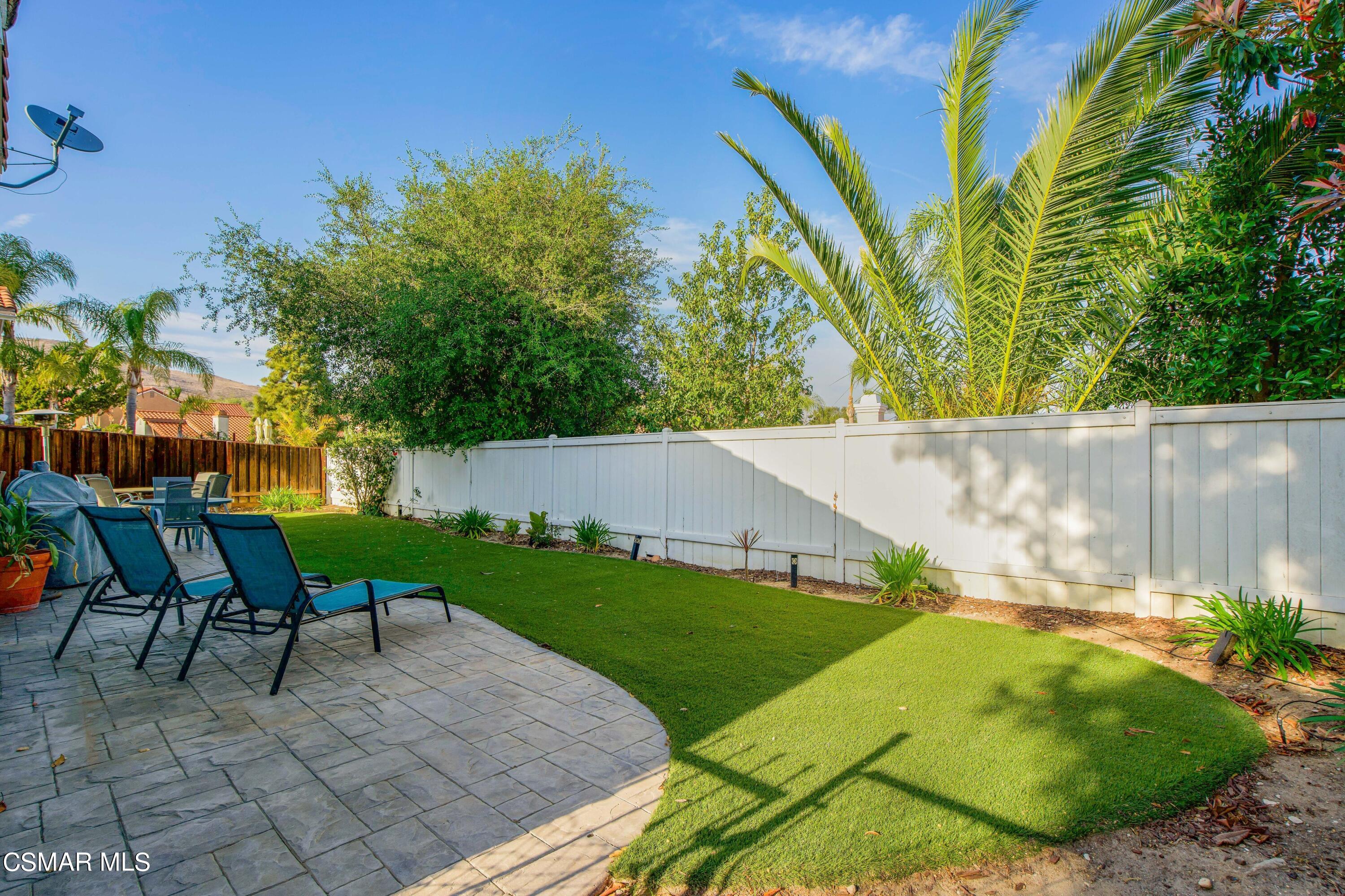 486 Fresh Meadows Road Simi Valley, CA 93065 - Photo 28 of 30 an outdoor sitting area with a table and chairs