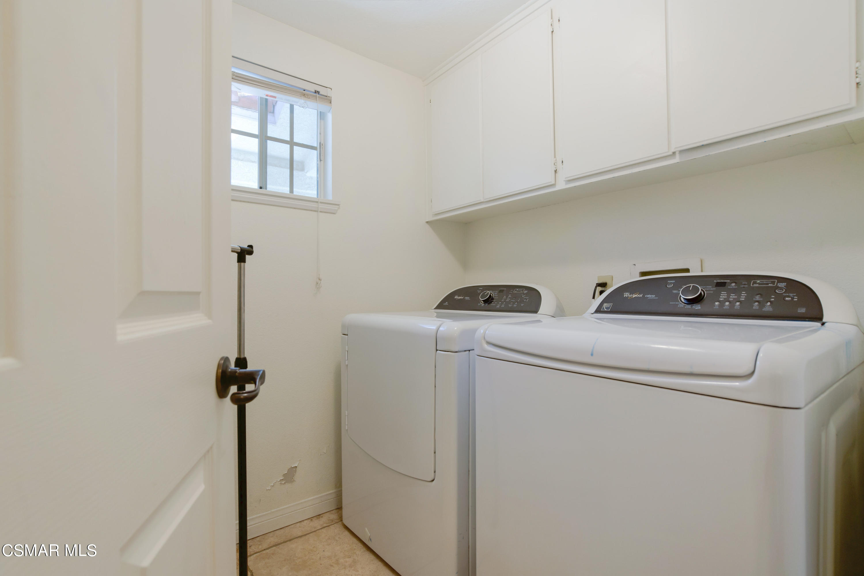 486 Fresh Meadows Road Simi Valley, CA 93065 - Photo 30 of 30 a utility room with dryer and washer
