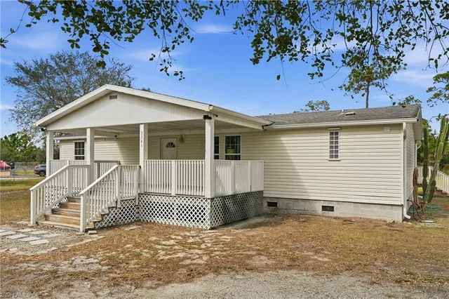 a front view of a house with a garage
