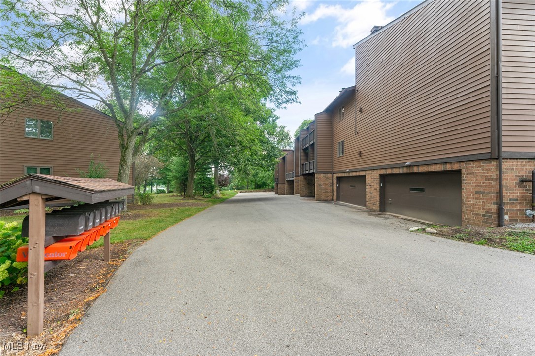 1175 East Calla Road, Unit C215 Youngstown, OH 44514 - Photo 4 of 44 Lower level garage entry and mail boxes