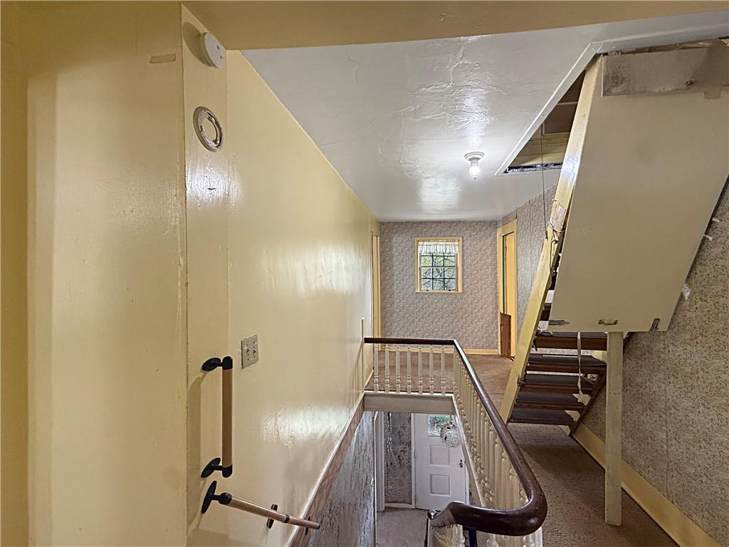 219 Ridgemont Drive Darlington, PA 16115 - Photo 20 of 50 Folding stairs lead to the attic/extra space