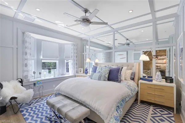 a bed room with a bed and a couch